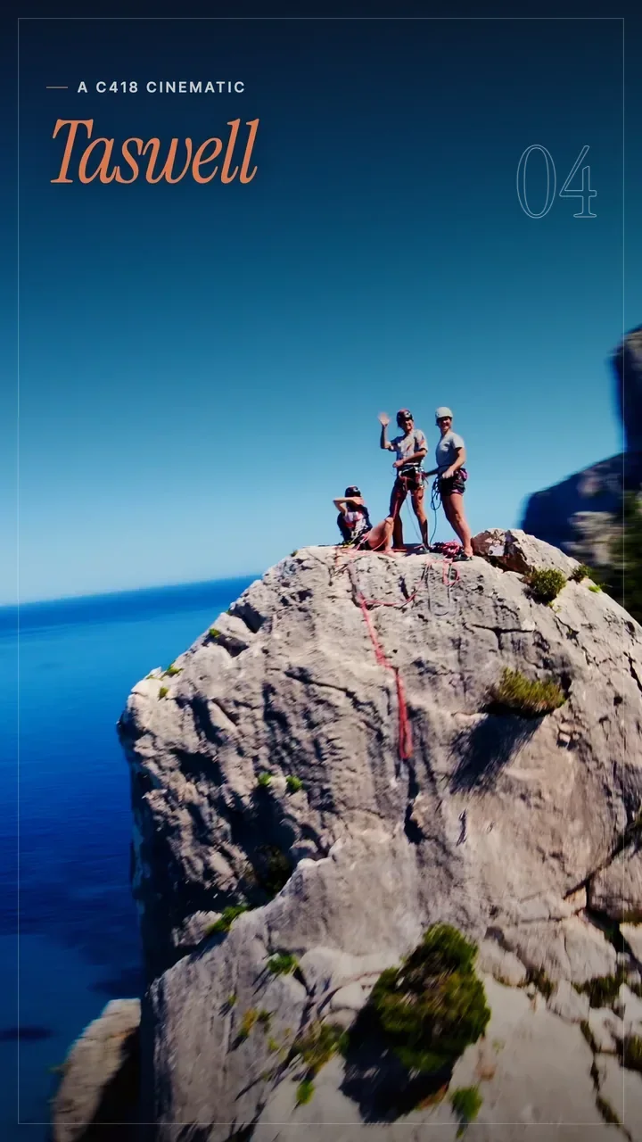 Poster titled Taswell: climbers wave from the top of a sea cliff above deep blue water, a C418 cinematic edit.